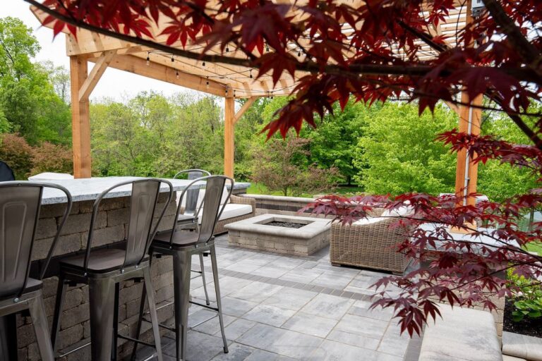 Unilock dimensional grill island with granite countertop outdoor kitchen