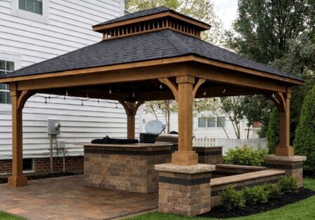 Comparison of open-air cedar pergola vs. full-roof timber pavilion in Dublin, Ohio