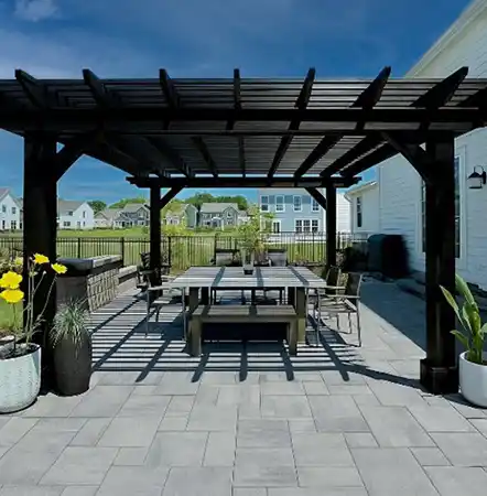 Custom-built cedar pergola with integrated lighting for a backyard in Powell, Ohio